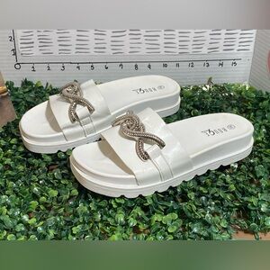 Rouge Helium White Slide Sandals with Silver Chain Accent